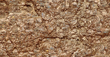 Stone texture of gold color.