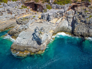 Aerial view of Katafygi rocky plateau beach in Mani, Greece