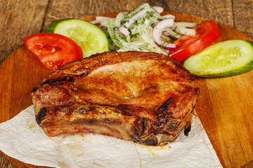 Grilled juicy pork tenderlion steak