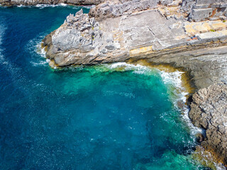 Aerial view of Katafygi rocky plateau beach in Mani, Greece