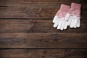 gloves on old wooden background