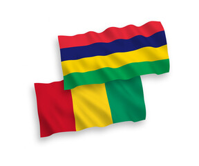 Flags of Guinea and Republic of Mauritius on a white background