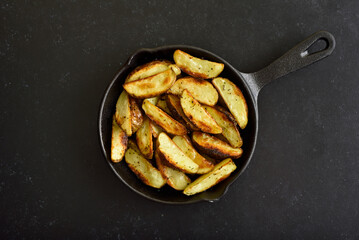 Fried potato wedges