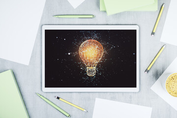 Creative idea concept with light bulb illustration on modern digital tablet screen. Top view. 3D Rendering
