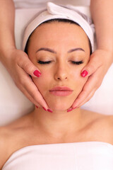 Face of a woman in close up mode, massage