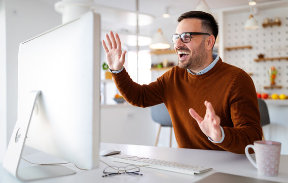 Man Having Video Conferencing Call Via Computer. Working Remotely Managing Team And Work From Home