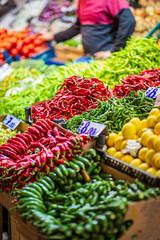Colorful view of greengrocery counter with several fruits and vegetables