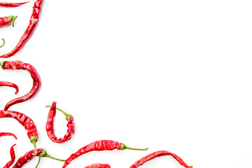 Dried chili peppers isolated on white background top and bottom arrangement. Flat layout