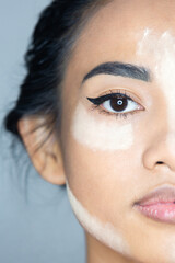 Asian woman with contour powder on the face/ highlight contouring