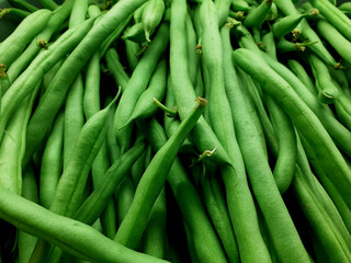 Beans are a type of legume, green beans are vegetables that many people like.
