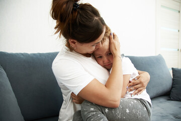 The mother pities daughter.The little girl is sad. Mother becalms litlle girl