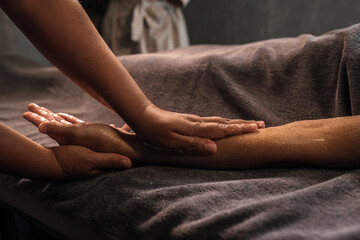 Spa concept. Specialist massaging male hand with scrub