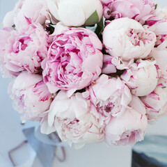 Bouquet with pink peonies of the Sarah Bernhardt variety