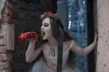 Creepy dead bride with bloody meat. Halloween scene