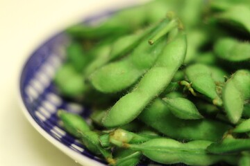 Boiled Edamame, green soybeans on a plate