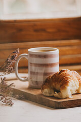 best coffee ever - croissant - medialuna - wooden stage