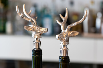Wine bottle closure in the shape of a deer's head