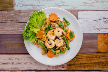 Stir-fried rice noodles with soy sauce and shrimp