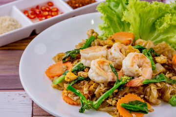 Stir-fried rice noodles with soy sauce and shrimp