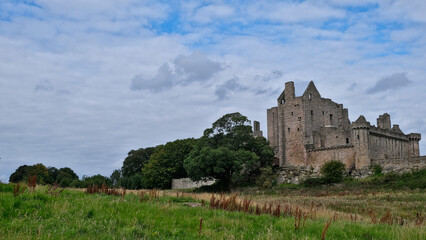 Summer photo of the famous Craigmillar Castle and gardens, home of Mary Queen of Scots in Edinburgh Scotland UK