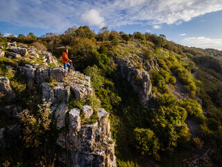 Photographer taking shots of Cheddar Gorge in England