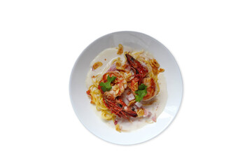 spaghetti carbonara cheese with shrimps , prawns and bacon in the white plate is isolated on white background