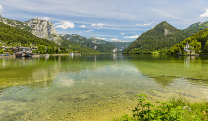 Lake Grundlsee in summer. Village Grundlsee, region Salzkammergut, Liezen district of Styria, Austria, Europe.