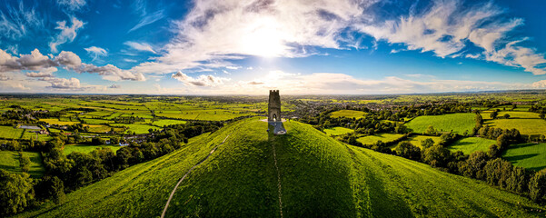 Fototapeta Glastonbury Tor near Glastonbury in the English county of Somerset, topped by the roofless St Michael's Tower, UK obraz