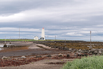 Obraz premium Landscape view with Grotta Island Lighthouse near Reykjavik.