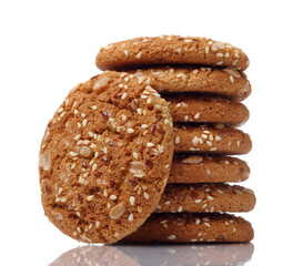 Oatcakes with sunflower and flax seeds isolated on white background. Concept of healthy food.