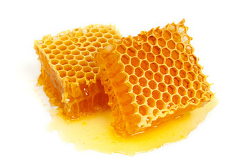 Bee combs with honey isolated on a white background. A flowing sweet dessert. A portion of a...