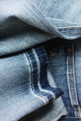 Fototapeta premium Beautiful blue jeans background close up view