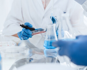 close up. image of scientists microbiologists conduct research