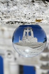 The Monument to the Fallen of the First World War inside a crystal ball. Ancona, Marche, Italy.