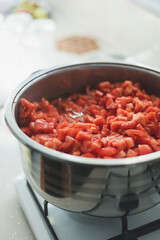 Canned tomato sauce, prepared at home.Harvesting for the winter. tomato sauce preparation for winter