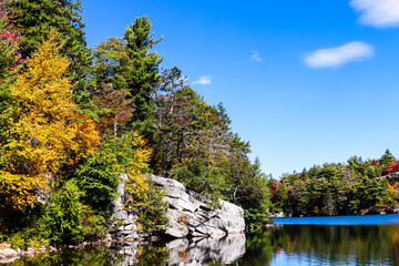 Lake Minnewaska state park in New York with fall colors - a perfect fall tourism destination for New York City residents