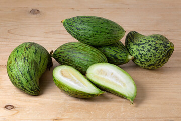 Fresh whole and halved Kelek fruit