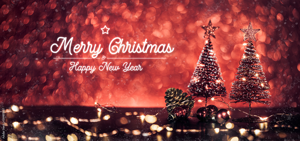 Poster merry christmas and happy new year text over xmas tree on red glitter sparkling lights festive bokeh