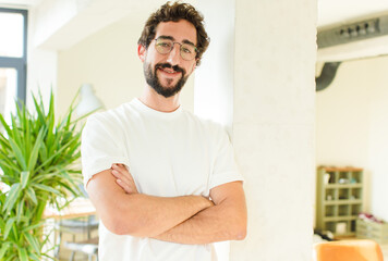 young bearded man at home.