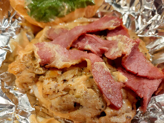 Exploded view of burger. close up view of Classic hamburger ingredients. yummy beef meat.