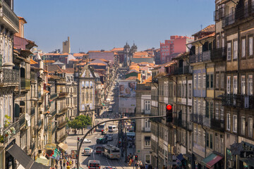 Fototapeta premium Street of Porto surrounded by houses with traffic