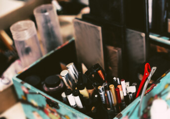 close up. large cardboard box with cosmetics and personal items.