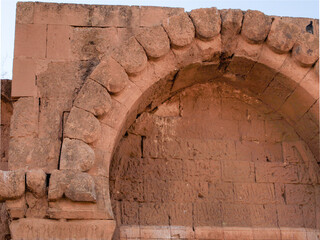 Ruins of ancient stone bricks arch detail of a village bulidings in an anatolian town. Middle east...