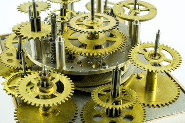 Details of the old clockwork on a white background.