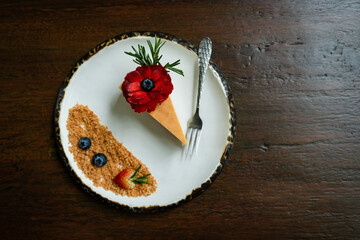 Top view photos of beautifully decorated cakes on white tiled plates and background of old wooden tables