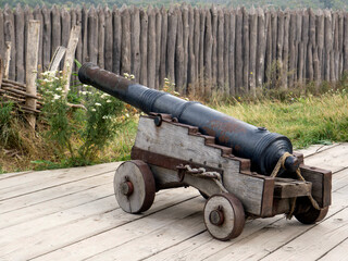 Ancient weapons. Cannon. Small wooden wheels.