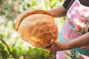 Trabzon Bread, Bakery Products, Pastry and Bakery woman's hand holding trabzon bread