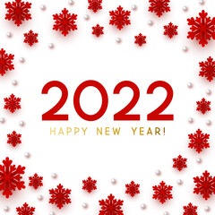 New Year concept - 2022 numbers on red background with paper snowflakes for winter holidays design