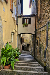 Naklejka premium An alley among the old houses of Fiuggi, a medieval village in the Lazio region.
