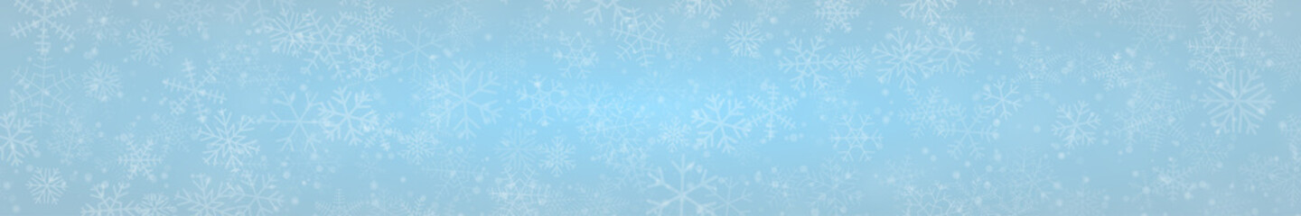 Obraz na płótnie Canvas Christmas banner of snowflakes of different shapes, sizes and transparency on light blue background
